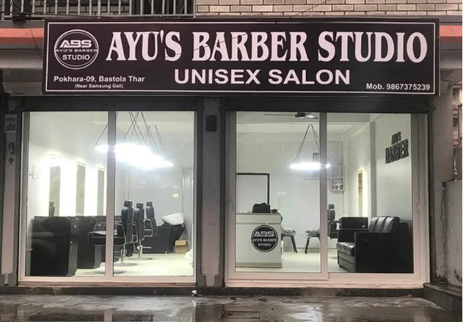 Bright Ayu's Barber Studio storefront with visible chairs and waiting area