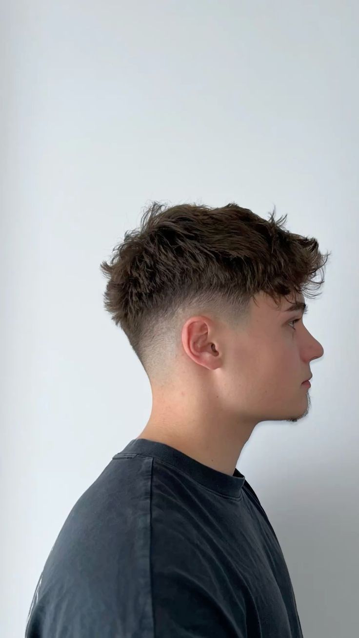 Side profile of a textured men's haircut